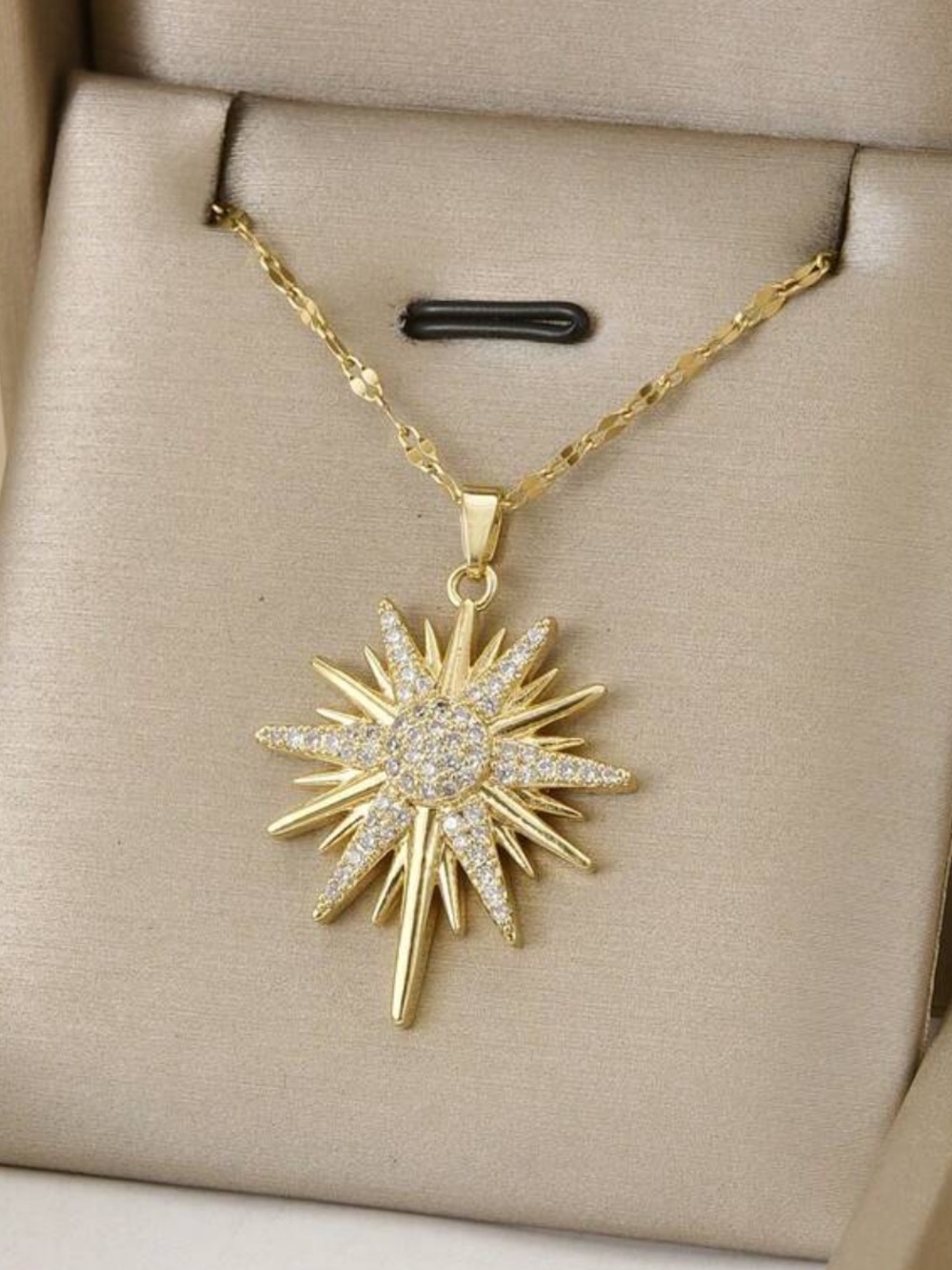 Radiant Gold Starburst Pendant Necklace with Pavé Accents